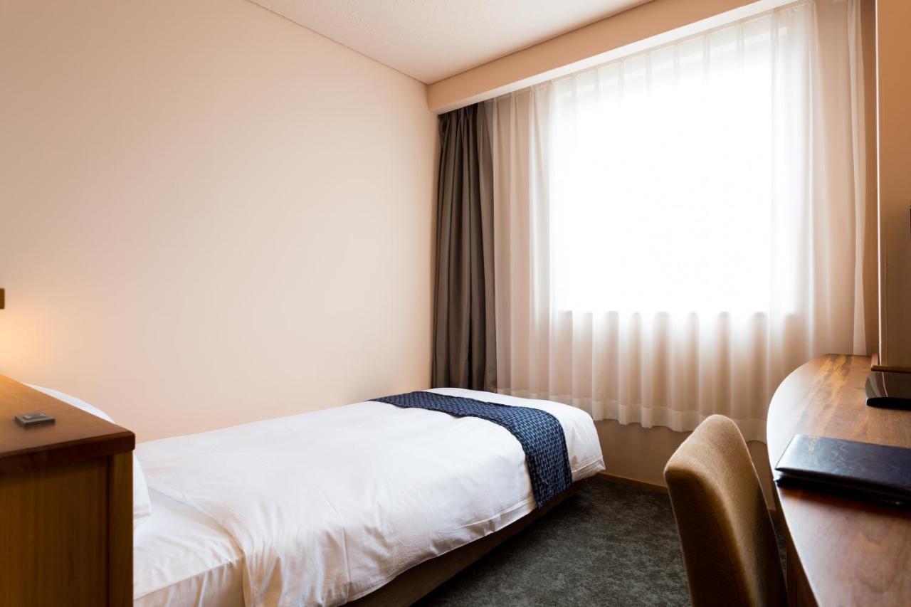 Takanokono Hotel Мацуяма Экстерьер фото